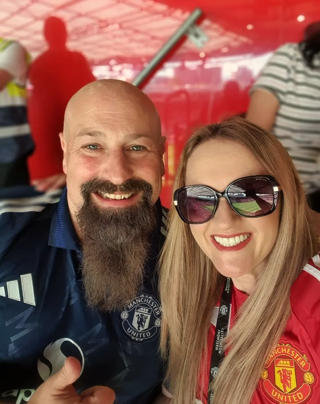 Neil Lock and Natalie Lock, co-founders, at a stadium